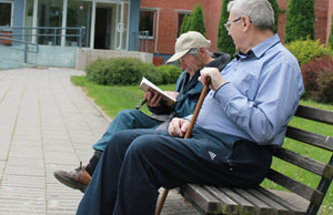 Senior citizens Sitting on a bench